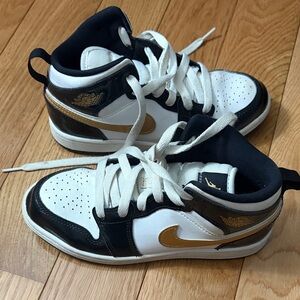 Nike air Jordan White and Black Sneakers with Gold Details